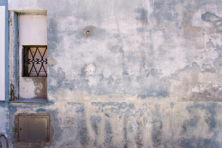 Picturesque windows with shutters on the famous island Burano, Venice, Italy