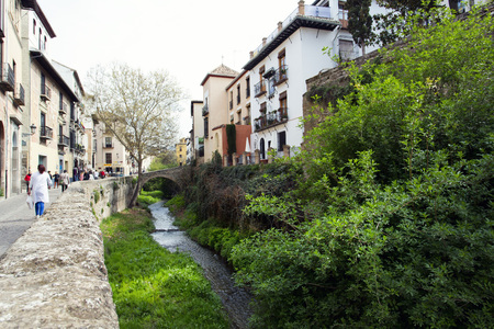 Beautiful view of the Street Carrera del Darro in Albaicin, Granada, Spainの写真素材