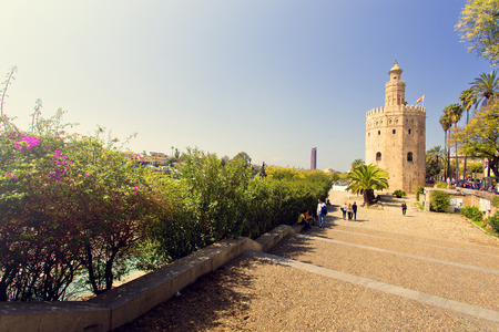 The famous Golden tower, Torre del Oro, along the Guadalquivir river, the Moorish tower built to defend Sevilla, Andalusia, Spain のeditorial素材