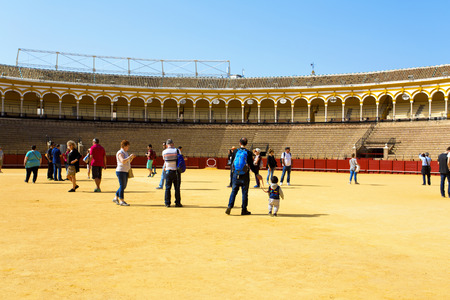 SEVILLE, SPAIN, March 18, 2017: Turists visiting the famous museum of Plaza de toros, bullfight arena, in Seville, Andalusia, Spainのeditorial素材
