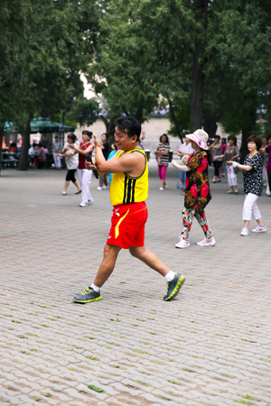 BEIJING, CHINA, 2013 June 20: Tai Chi exercises in the Temple of Heaven in Beijingのeditorial素材