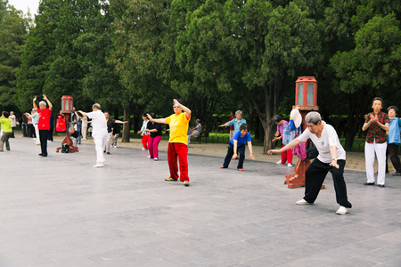 BEIJING, CHINA, 2013 June 20: Tai Chi exercises in the Temple of Heaven in Beijingのeditorial素材