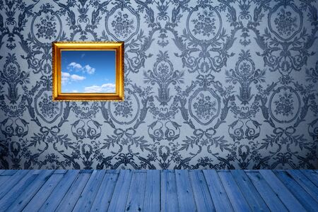 Old picture frame on grunge walの写真素材
