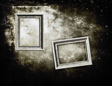 Old picture frame on grunge wal