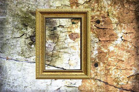 Old picture frame on grunge walの写真素材