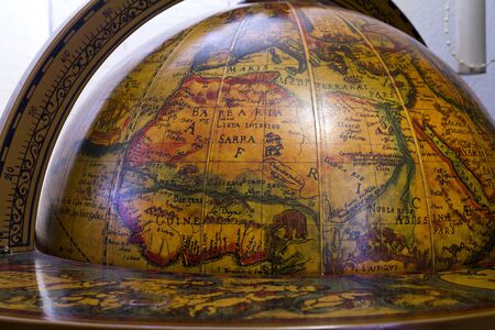 Close up of decorated wooden globeの写真素材