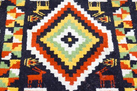 Close up of Persian carpet, focus selected