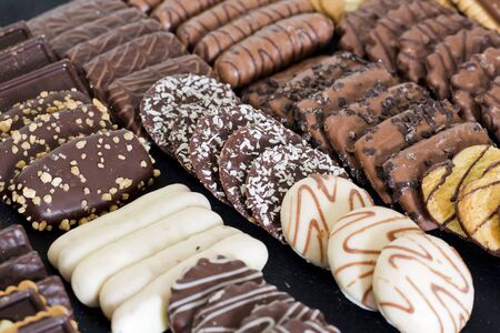 Glovebox with mixed chocolates of different flavorsの写真素材