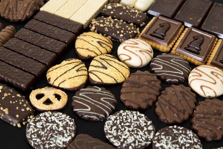 Glovebox with mixed chocolates of different flavors
