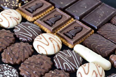 Glovebox with mixed chocolates of different flavorsの写真素材