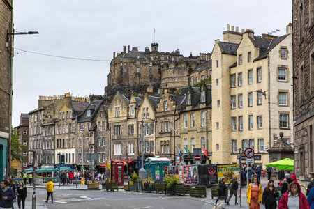 EDINBURGH, SCOTLAND 2022, August 21: Edinburgh street views, old town. People walking on the road....