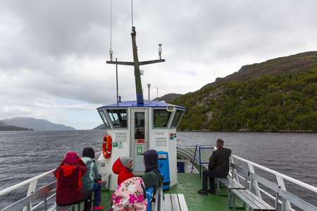 LOCH NESS, SCOTHLAND 2022, August 20: The famous Loch Ness, in Scotland. Tourists on a mini cruise boat in Loch Nessのeditorial素材