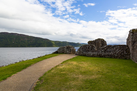 Ruins of Urquhart Castle along Loch Ness, Scotland, Great Britainの写真素材