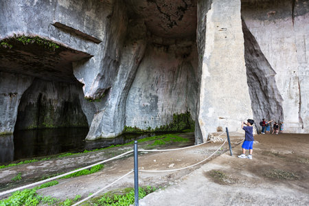 SYRACUSE, SICILY 2023 November 03: Latomie of Paradise. The Saltpetre Cave in Neapolis of Syracuseの写真素材