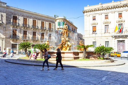 SYRACUSE, SICILY 2023 November 04: Fountain of Diana in Archimede Square in Ortigia, Syracuse, Sicilyの写真素材