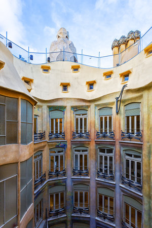 BARCELONA, SPAIN - 4 January, 2024: Modernist house Casa Mila also known as La Pedrera designed by Antoni Gaudiの写真素材
