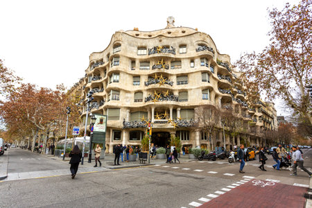 BARCELONA, SPAIN - 4 January, 2024: Modernist house Casa Mila also known as La Pedrera designed by Antoni Gaudiの写真素材