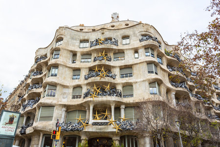 BARCELONA, SPAIN - 4 January, 2024: Modernist house Casa Mila also known as La Pedrera designed by Antoni Gaudiの写真素材