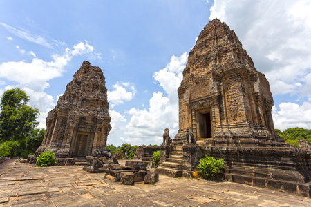Two brick towers stand prominently at the ancient Pre Rup temple in Angkor, Cambodiaの写真素材