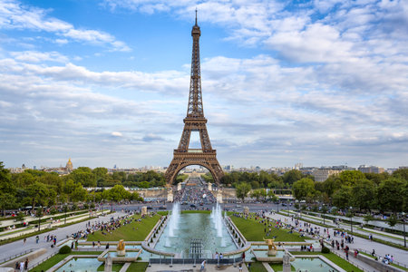 Tourists and locals gather on the terraces of the Jardins du TrocadÃ©eo with an iconic view of the Eiffel Tower across the Pont d'IÃ©na.の写真素材