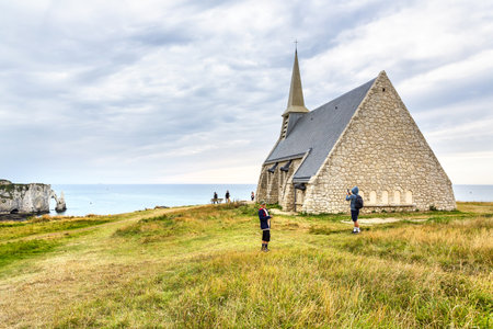 Chapel Notre Dame de la Garde overlooking the Etretat Cliffs, Franceの写真素材