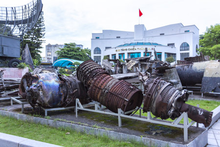 Damaged jet engines and b-52 Victory Museum building in Hanoi, Vietnamの写真素材