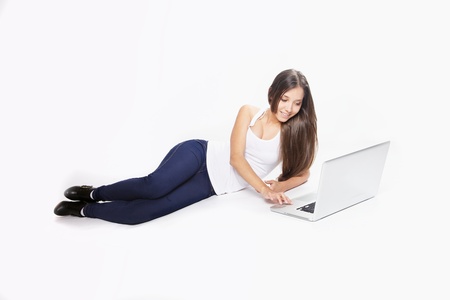 Brunette with a laptopの写真素材