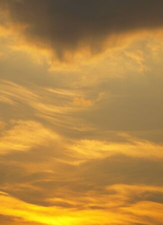 Summer background with white flying clouds on blue sky. Romantic abstract natural heaven backdrop.の写真素材
