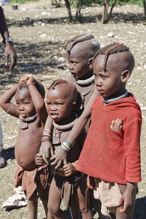KAOKOLAND NAMIBIA - MAY 4: Unidentified child near Opuwo on May 4, 2008, Namibia. Himbas are the last Nomadic People in Namibia - there are only about 7000 leftのeditorial素材