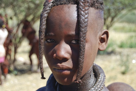 KAOKOLAND NAMIBIA - MAY 4: Unidentified child near Opuwo on May 4, 2008, Namibia. Himbas are the...