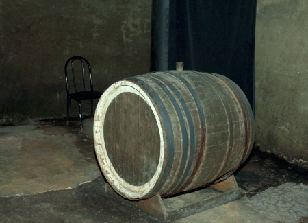 Old wine barrels, wine cellar in industry roomの写真素材
