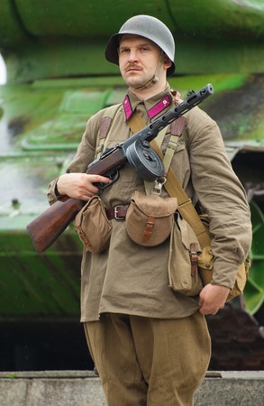 RUSSIA, BORODINO - OCTOBER 12: Unidentified soldier on guard of honour on reenactment of the battle in WWII near the Borodino village in 1941, in Moscow region, Borodino, on 12 October, 2014, Russiaのeditorial素材