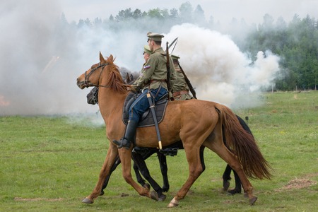 RUSSIA, CHERNOGOLOVKA - MAY 17: Cavalry soldiers ride on History reenactment of battle of Civil War...