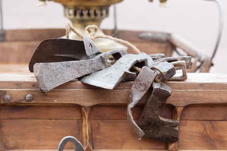 Axes on wooden carriage back