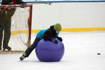 MOSCOW - JANUARY 25: Unidentified kid play with a ball on family sport event on January 25, 2015 in Moscow, Russiaのeditorial素材