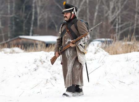 RUSSIA, APRELEVKA - FEBRUARY 7: Unidentified russian soldier walking on reenactment of the...