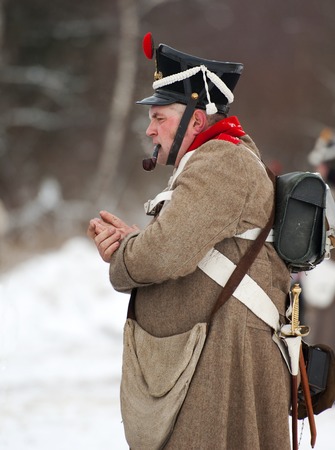 RUSSIA, APRELEVKA - FEBRUARY 7: Unidentified russian soldier smoking pipe on reenactment of the...