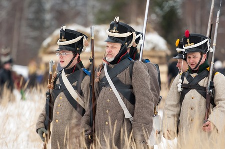 RUSSIA, APRELEVKA - FEBRUARY 7: Unidentified soldiers walking on reenactment of the Napoleonic maneuvers near the Aprelevka city, in 1812. Moscow region, Aprelevka, 7 February, 2015, Russiaのeditorial素材