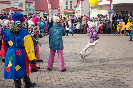 MOSCOW, RUSSIA - FEBRUARY 22: Unidentified people run in sack on Russian religious and folk holiday Maslenitsa near Culture center Peresvet on February 22, 2015, Russiaのeditorial素材