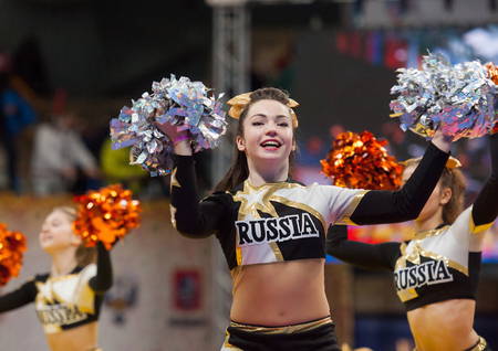 RUSSIA, MOSCOW - MARCH 27: Unidentified cheerleaders on World Sambo Championship Kharlampiev memorial in Luzhniki sport palace, Moscow, Russia, 2015のeditorial素材