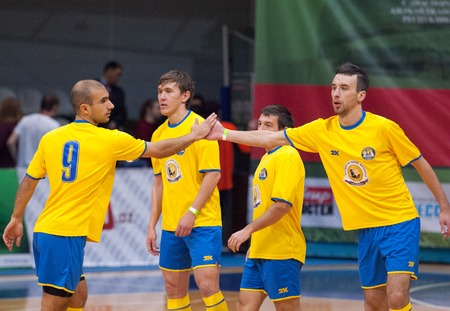 MOSCOW - DECEMBER 13: Unidentified players of RGGU team rejoice of a point on Minifootball tournament in memoriam Tofik Bahramov on  December 13, 2014, in Krilatskoe stadium, Moscow, Russiaのeditorial素材