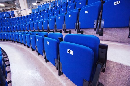 RUSSIA, MOSCOW - APRIL 27, 2015: Numbered seats row just before hockey game CSKA vs SKA teams on Hockey Cup of Legends in Ice Palace VTB, Moscow, Russiaのeditorial素材