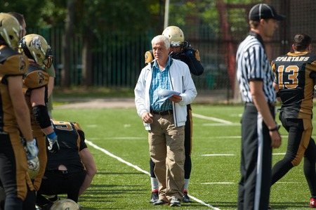 RUSSIA, TROITSK CITY - JULY 11:  Alexey Geets, head trainer of Spertans team on timeout during Russian american football Championship game Spartans vs Raiders 52 on July 11, 2015, in Moscow region, Troitsk city, Russiaのeditorial素材