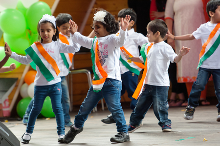 RUSSIA, MOSCOW - AUGUST 16, 2015: Unidentified kids of Star Group dance on Independence Day of India in Sokolniki park, Moscow, Russiaのeditorial素材
