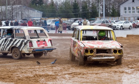 KUBINKA - NOVEMBER 21, 2015: Unidentified drivers crash a cars during auto gladiators show in Kubinka military museum, Russiaのeditorial素材