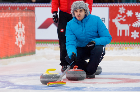 MOSCOW - JANUARY 17, 2016: Vasiliy Telezhkin in action on Russian Curling Champions Tour Moscow...