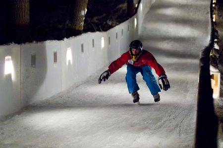 MOSCOW - JANUARY 16: Unidentified sportsman skate downhill during Ice Cross Downhill World Championship on January 15, 2016, in Moscow, Russiaのeditorial素材