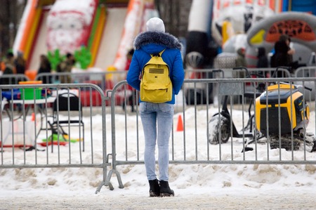 MOSCOW, RUSSIA - NOVEMBER 10, 2016: Unidentified girl watch on city event of open Winter game season on November 11, 2016, in Moscow, Russiaのeditorial素材