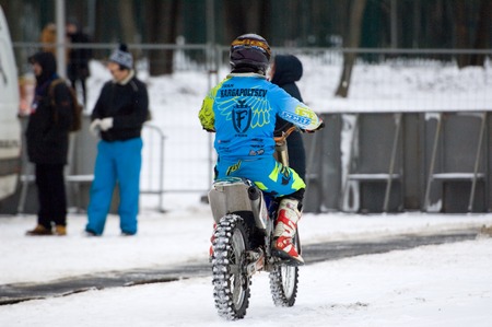 MOSCOW, RUSSIA - DECEMBER 10, 2016: FMX rider Ivan Kargopoltsev jump on bike trampoline on Winter game season opening event on December 10, 2016のeditorial素材