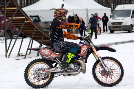 MOSCOW, RUSSIA - DECEMBER 10, 2016: FMX rider Vladimir Yarygin jump on bike trampoline on Winter game season opening event on December 10, 2016のeditorial素材